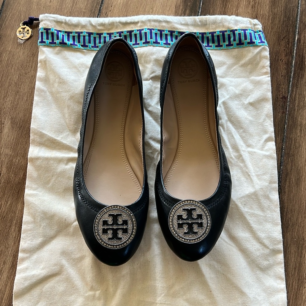 Tory Burch ballet flats. Black leather with rhinestone T emblem.